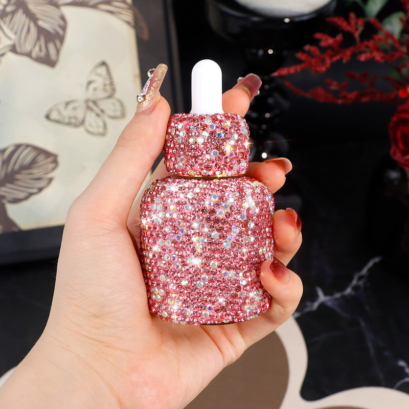 Luxury Skincare Oil - ผลิตภัณฑ์ดูแลผิวสูตรน้ำมันหอมระเหยสำหรับการเดินทางแบบหรูหรา บรรจุในขวดแก้วขนาดพกพา พร้อมหัวหยดแก้วประดับเพชร